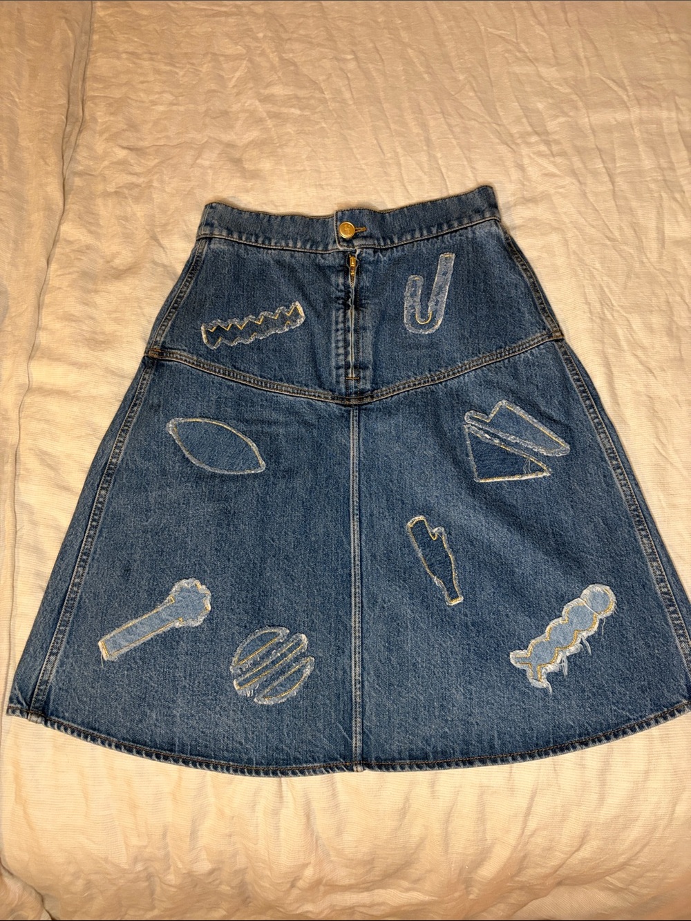 CHANEL Blue Denim A-Line Skirt with AppliquΓ© Details
